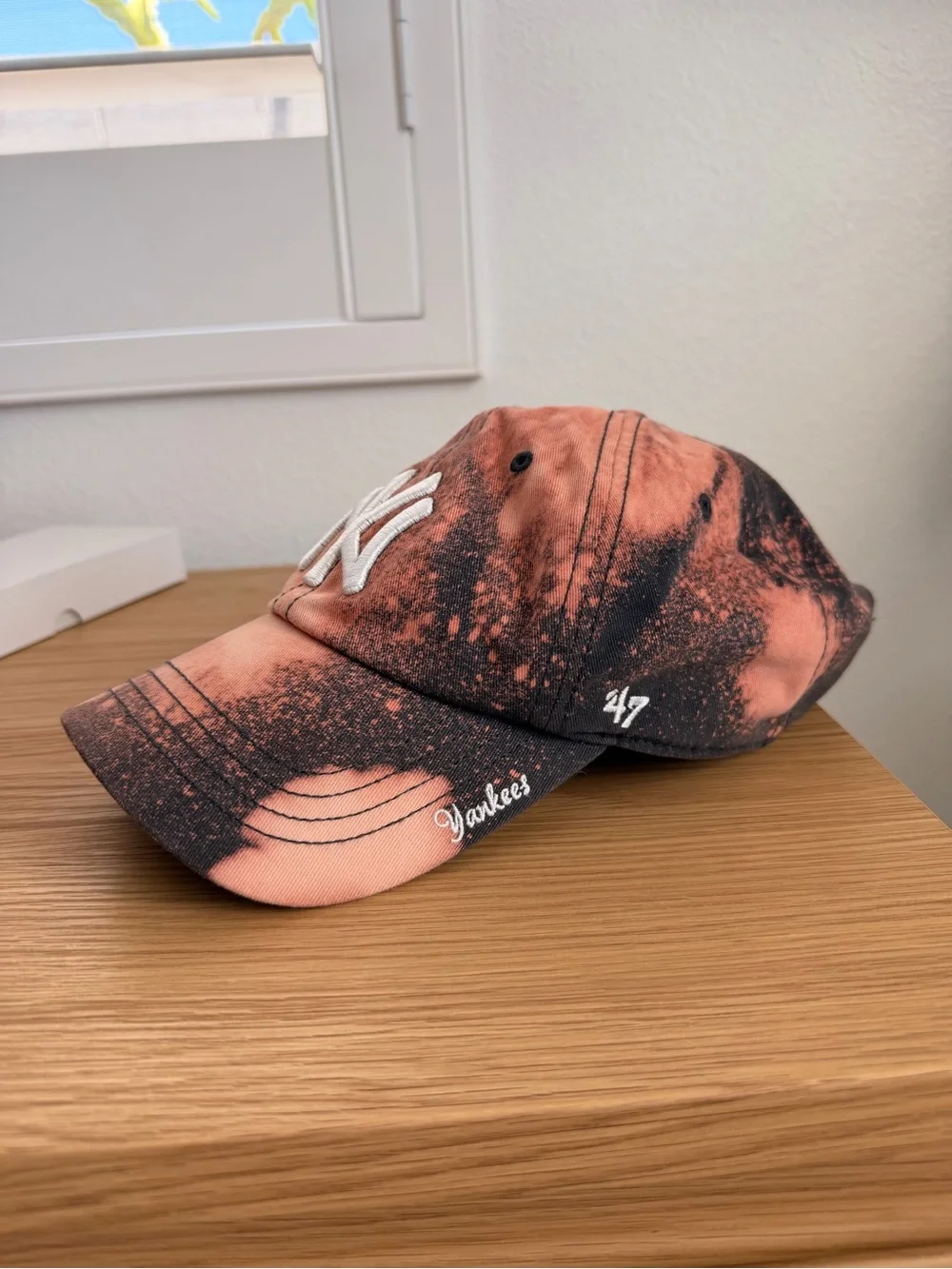Genuine Merchandise Navy and Orange Bleach-Effect Cap